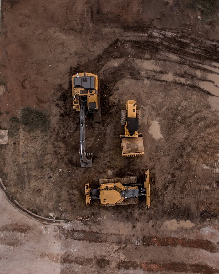aerial photo of excavator road roller and bulldozer 1579356.jpeg